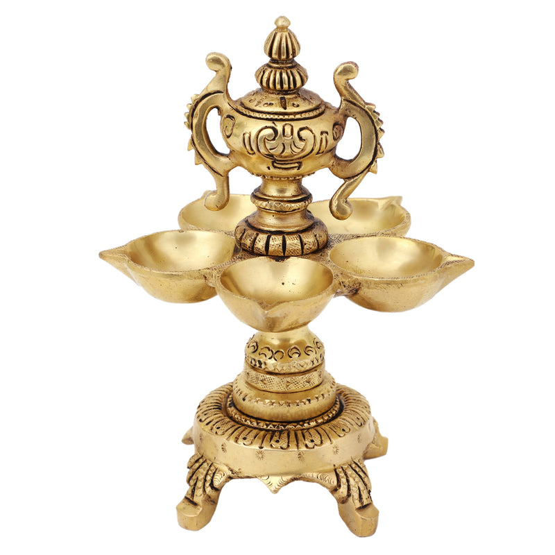 Brass Diya - exquisitely crafted brass oil lamp, traditional design, golden finish, decorative home accent, symbolizes spirituality and enlightenment, emits a warm and tranquil glow, ideal for religious ceremonies and festive occasions, enhances ambiance and decor with a touch of traditional elegance.