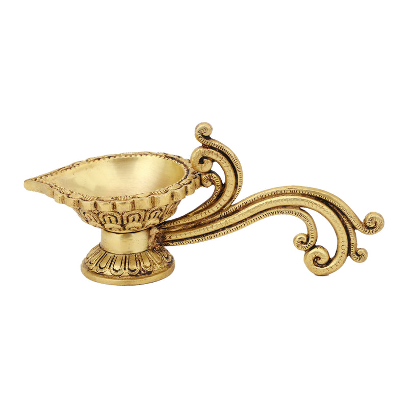 Brass Diya - exquisitely crafted brass oil lamp, traditional design, golden finish, decorative home accent, symbolizes spirituality and enlightenment, emits a warm and tranquil glow, ideal for religious ceremonies and festive occasions, enhances ambiance and decor with a touch of traditional elegance.