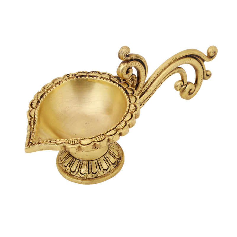 Brass Diya - exquisitely crafted brass oil lamp, traditional design, golden finish, decorative home accent, symbolizes spirituality and enlightenment, emits a warm and tranquil glow, ideal for religious ceremonies and festive occasions, enhances ambiance and decor with a touch of traditional elegance.