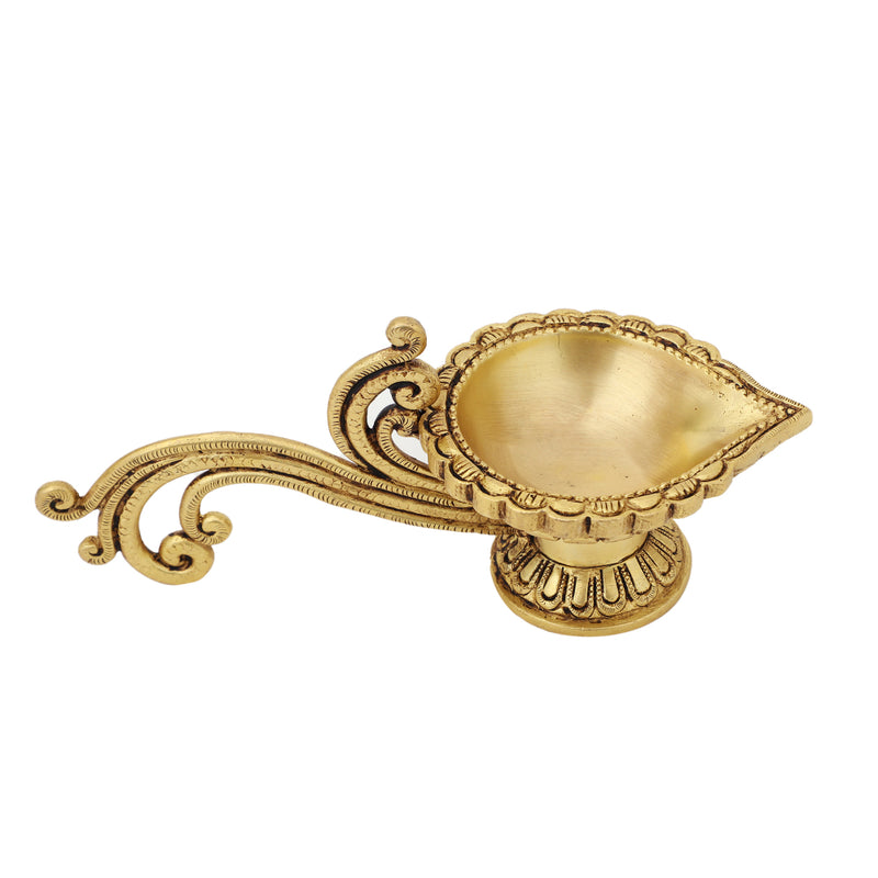 Brass Diya - exquisitely crafted brass oil lamp, traditional design, golden finish, decorative home accent, symbolizes spirituality and enlightenment, emits a warm and tranquil glow, ideal for religious ceremonies and festive occasions, enhances ambiance and decor with a touch of traditional elegance.