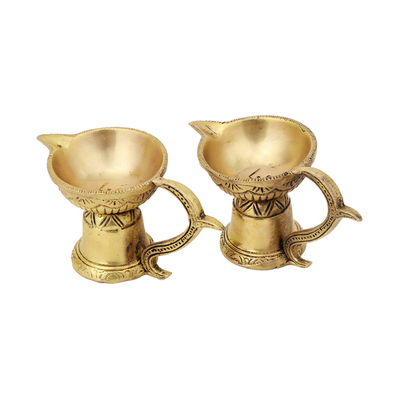 Brass small Akhand Diya - intricately designed brass oil lamp, compact size, traditional Indian Diya, golden finish, decorative home accent, emits a warm and serene glow, ideal for religious ceremonies and meditation, enhances spiritual ambiance and decor.