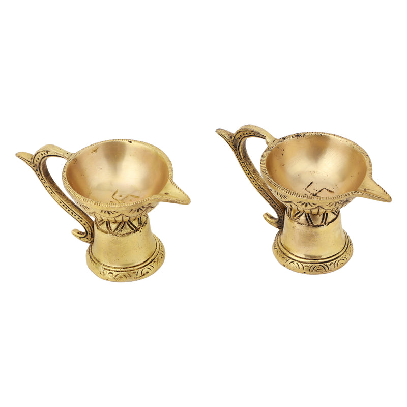 Brass small Akhand Diya - intricately designed brass oil lamp, compact size, traditional Indian Diya, golden finish, decorative home accent, emits a warm and serene glow, ideal for religious ceremonies and meditation, enhances spiritual ambiance and decor.