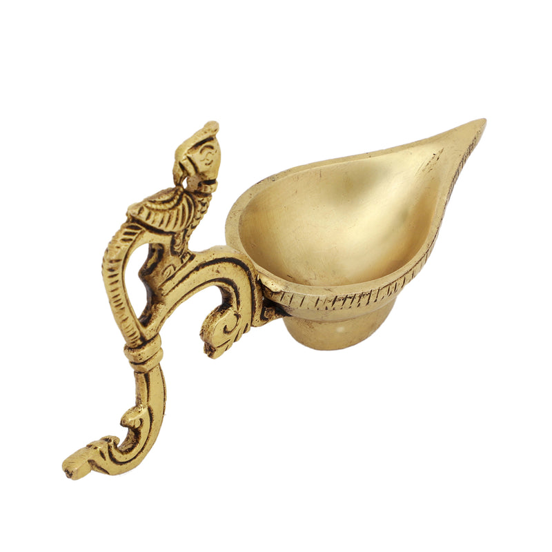 Brass peacock parrot Diya - exquisitely crafted brass oil lamp in the shape of a peacock with parrot motifs, golden finish, decorative home accent, fusion of elegance and vibrancy, traditional Indian Diya, emits a captivating and auspicious glow, perfect for festive occasions and religious ceremonies, enhances spiritual ambiance and decor with a touch of artistic brilliance.