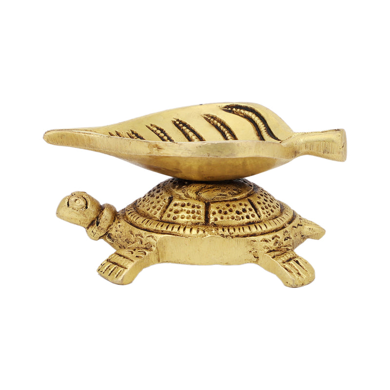 Brass small Akhand Turtle Diya - intricately designed brass oil lamp, compact size, traditional Indian Diya, golden finish, decorative home accent, emits a warm and serene glow, ideal for religious ceremonies and meditation, enhances spiritual ambiance and decor.