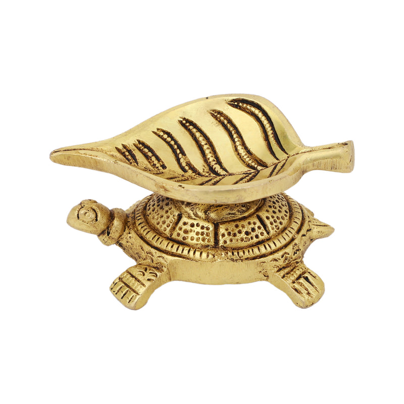 Brass small Akhand Turtle Diya - intricately designed brass oil lamp, compact size, traditional Indian Diya, golden finish, decorative home accent, emits a warm and serene glow, ideal for religious ceremonies and meditation, enhances spiritual ambiance and decor.