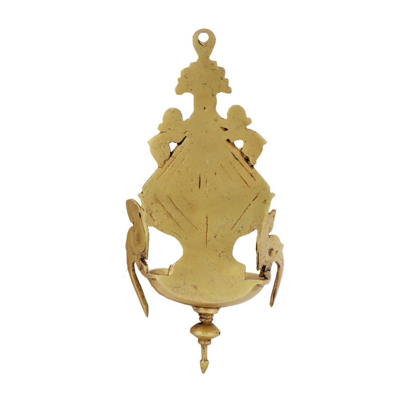 Brass Wall Diya - intricately designed brass oil lamp for wall mounting, golden finish, decorative home accent, traditional Indian Diya, emits a warm and inviting glow, ideal for enhancing wall decor and creating an ambiance of serenity, perfect for religious ceremonies and festive occasions, adds a touch of traditional charm to interior spaces.