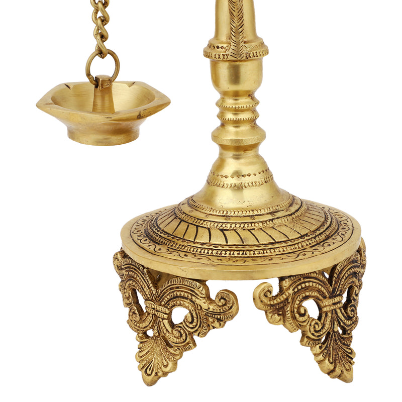 Brass peacock parrot Diya - exquisitely crafted brass oil lamp in the shape of a peacock with parrot motifs, golden finish, decorative home accent, fusion of elegance and vibrancy, traditional Indian Diya, emits a captivating and auspicious glow, perfect for festive occasions and religious ceremonies, enhances spiritual ambiance and decor with a touch of artistic brilliance.