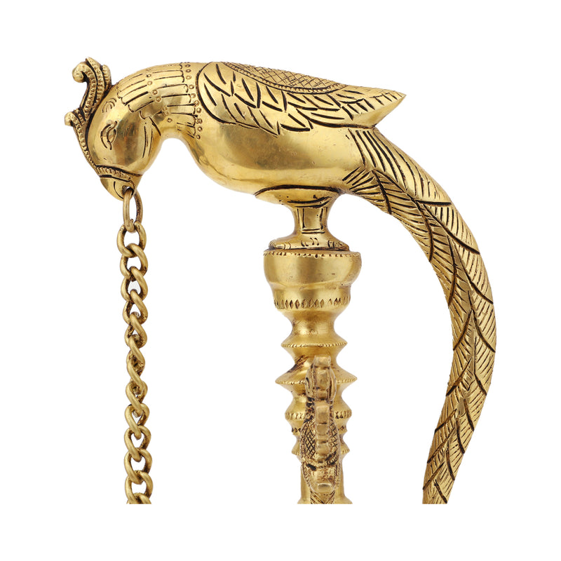 Brass peacock parrot Diya - exquisitely crafted brass oil lamp in the shape of a peacock with parrot motifs, golden finish, decorative home accent, fusion of elegance and vibrancy, traditional Indian Diya, emits a captivating and auspicious glow, perfect for festive occasions and religious ceremonies, enhances spiritual ambiance and decor with a touch of artistic brilliance.