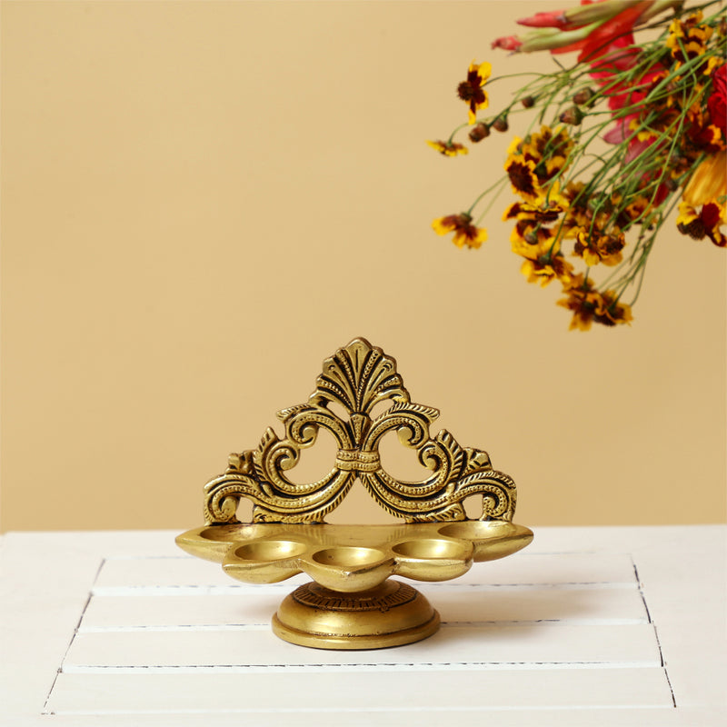 Brass small Akhand Diya - intricately designed brass oil lamp, compact size, traditional Indian Diya, golden finish, decorative home accent, emits a warm and serene glow, ideal for religious ceremonies and meditation, enhances spiritual ambiance and decor.