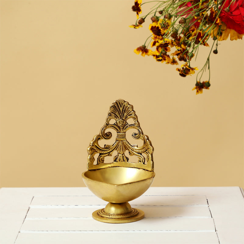 Brass small Akhand Diya - intricately designed brass oil lamp, compact size, traditional Indian Diya, golden finish, decorative home accent, emits a warm and serene glow, ideal for religious ceremonies and meditation, enhances spiritual ambiance and decor.