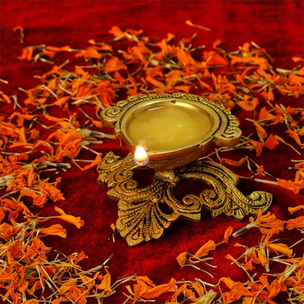 Brass small Akhand Diya - intricately designed brass oil lamp, compact size, traditional Indian Diya, golden finish, decorative home accent, emits a warm and serene glow, ideal for religious ceremonies and meditation, enhances spiritual ambiance and decor.