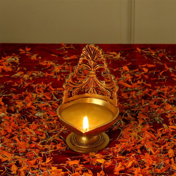 Brass small Akhand Diya - intricately designed brass oil lamp, compact size, traditional Indian Diya, golden finish, decorative home accent, emits a warm and serene glow, ideal for religious ceremonies and meditation, enhances spiritual ambiance and decor.