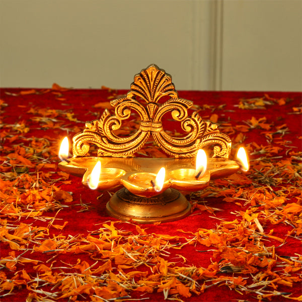 Brass small Akhand Diya - intricately designed brass oil lamp, compact size, traditional Indian Diya, golden finish, decorative home accent, emits a warm and serene glow, ideal for religious ceremonies and meditation, enhances spiritual ambiance and decor.