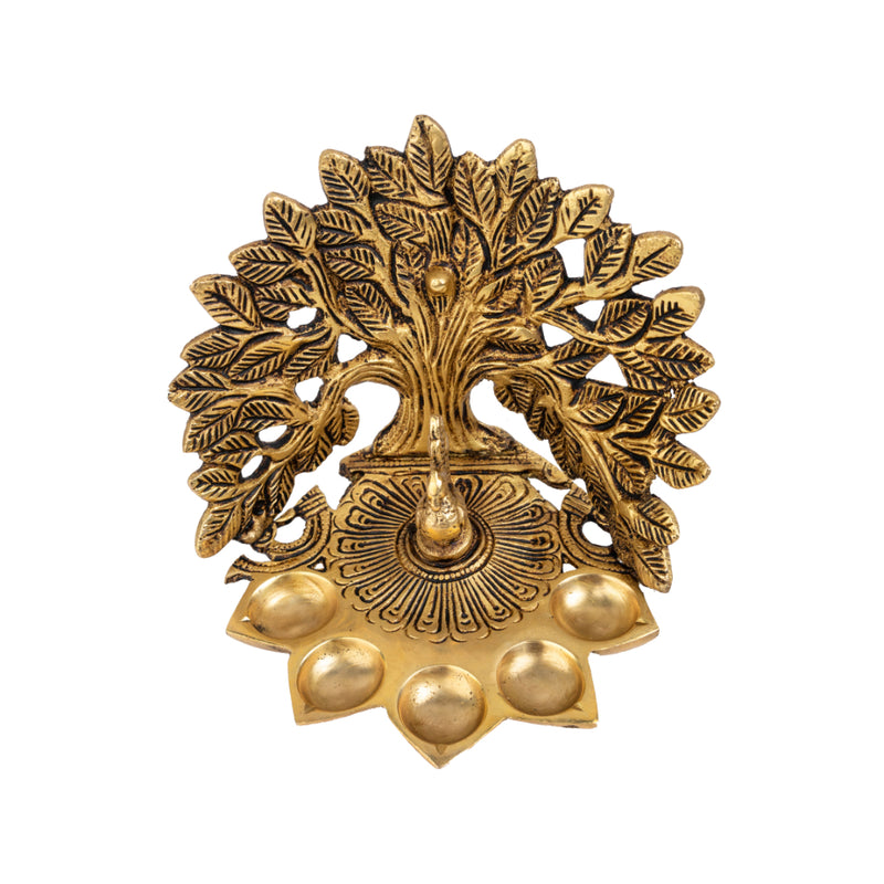 Brass Tree Diya - meticulously designed brass oil lamp in the shape of a tree, golden finish, decorative home accent, symbolizes growth and prosperity, traditional Indian Diya, emits a warm and radiant glow, perfect for festive celebrations and spiritual rituals, enhances spiritual ambiance and decor with a touch of natural beauty.