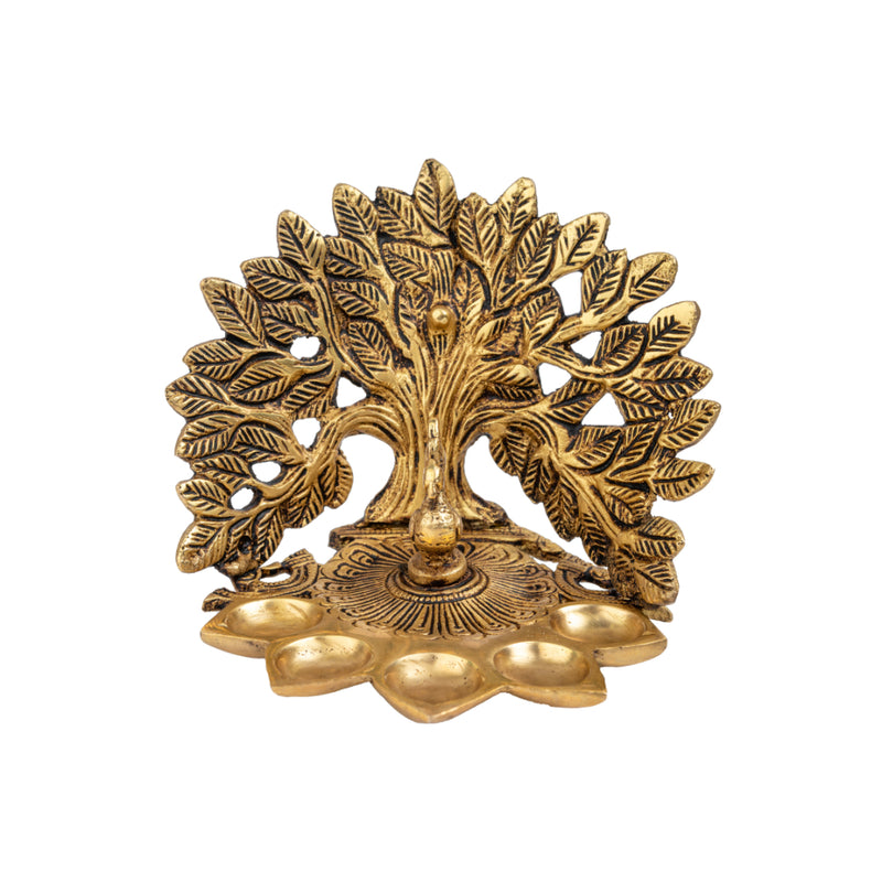 Brass Tree Diya - meticulously designed brass oil lamp in the shape of a tree, golden finish, decorative home accent, symbolizes growth and prosperity, traditional Indian Diya, emits a warm and radiant glow, perfect for festive celebrations and spiritual rituals, enhances spiritual ambiance and decor with a touch of natural beauty.