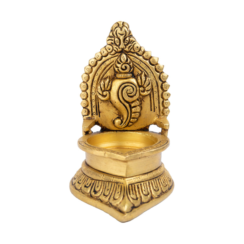 Brass Shank Diya - intricately designed brass oil lamp in the shape of a conch shell, golden finish, decorative home accent, symbolizes purity and spirituality, traditional Indian Diya, emits a radiant and calming glow, perfect for religious ceremonies and meditation, enhances spiritual ambiance and decor with a touch of serenity.