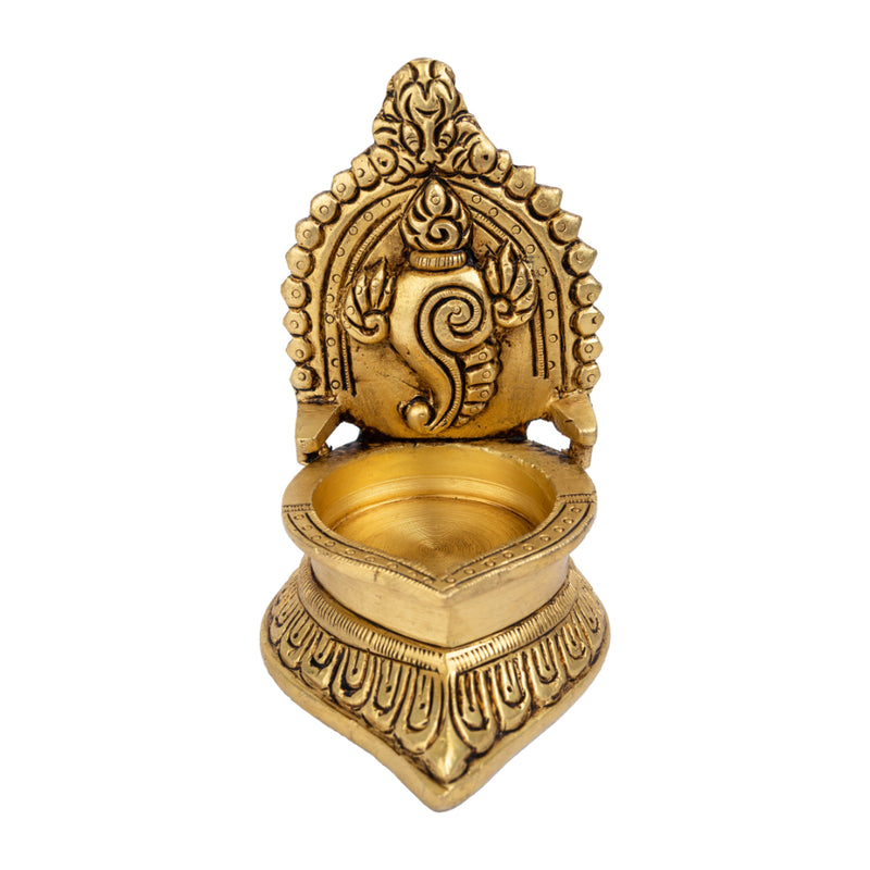 Brass Shank Diya - intricately designed brass oil lamp in the shape of a conch shell, golden finish, decorative home accent, symbolizes purity and spirituality, traditional Indian Diya, emits a radiant and calming glow, perfect for religious ceremonies and meditation, enhances spiritual ambiance and decor with a touch of serenity.