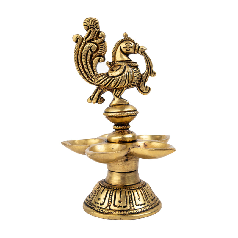 Brass peacock parrot Diya - exquisitely crafted brass oil lamp in the shape of a peacock with parrot motifs, golden finish, decorative home accent, fusion of elegance and vibrancy, traditional Indian Diya, emits a captivating and auspicious glow, perfect for festive occasions and religious ceremonies, enhances spiritual ambiance and decor with a touch of artistic brilliance.