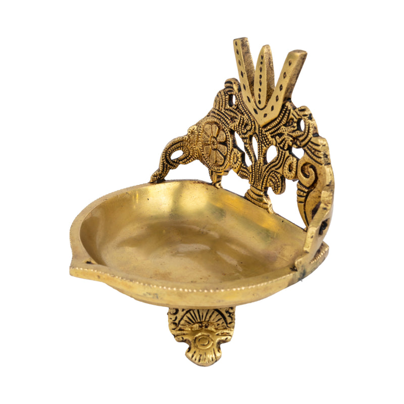 Brass Shank Trishul Chakra Diya - intricately designed brass oil lamp in the shape of a conch shell with trishul (trident) and chakra motifs, golden finish, decorative home accent, symbolizes divine energy and protection, traditional Indian Diya, emits a sacred and luminous glow, perfect for religious rituals and spiritual practices, enhances spiritual ambiance and decor with a touch of auspiciousness.