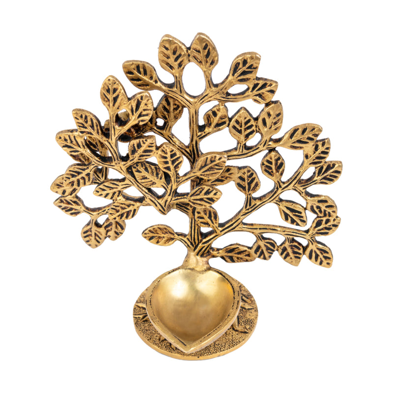 Brass Tree Diya - meticulously designed brass oil lamp in the shape of a tree, golden finish, decorative home accent, symbolizes growth and prosperity, traditional Indian Diya, emits a warm and radiant glow, perfect for festive celebrations and spiritual rituals, enhances spiritual ambiance and decor with a touch of natural beauty.