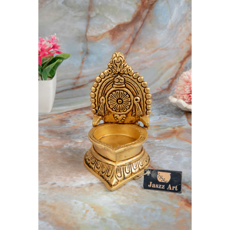 Brass Chakra Diya - beautifully crafted brass oil lamp with Chakra design, golden finish, decorative home accent, traditional Indian Diya, symbolizes spiritual energy and balance, emits a radiant and peaceful glow, perfect for rituals and meditation, enhances spiritual ambiance and decor