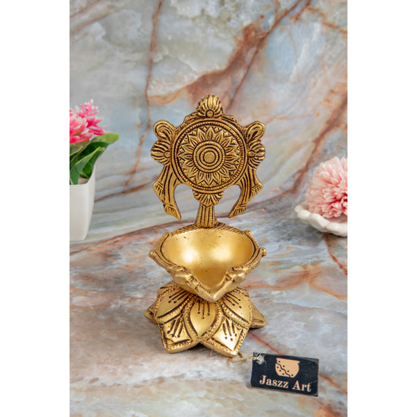 Brass Chakra Diya - beautifully crafted brass oil lamp with Chakra design, golden finish, decorative home accent, traditional Indian Diya, symbolizes spiritual energy and balance, emits a radiant and peaceful glow, perfect for rituals and meditation, enhances spiritual ambiance and decor