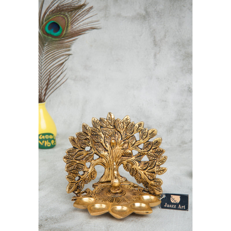 Brass Tree Diya - meticulously designed brass oil lamp in the shape of a tree, golden finish, decorative home accent, symbolizes growth and prosperity, traditional Indian Diya, emits a warm and radiant glow, perfect for festive celebrations and spiritual rituals, enhances spiritual ambiance and decor with a touch of natural beauty.