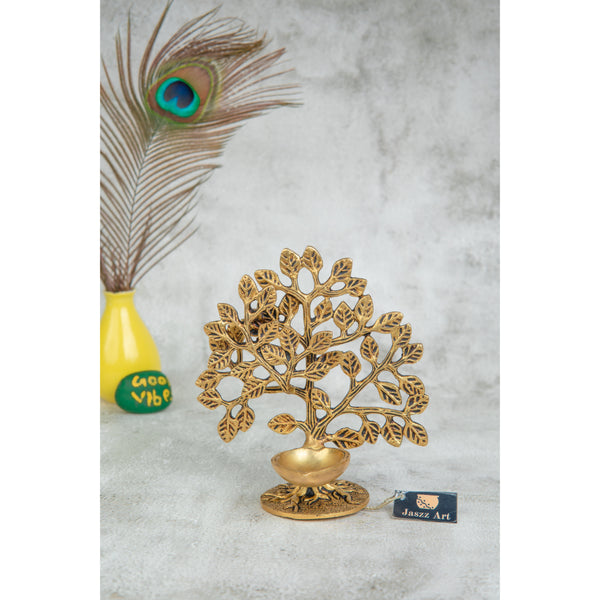 Brass Tree Diya - meticulously designed brass oil lamp in the shape of a tree, golden finish, decorative home accent, symbolizes growth and prosperity, traditional Indian Diya, emits a warm and radiant glow, perfect for festive celebrations and spiritual rituals, enhances spiritual ambiance and decor with a touch of natural beauty.