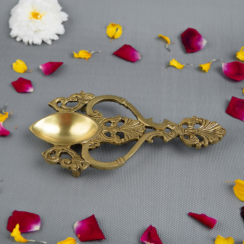 Brass Pooja Spoon - beautifully crafted brass spoon for religious rituals, ideal for offering sacred substances during prayers and ceremonies, golden finish, perfect for home puja setups and spiritual practices, symbolizes purity and devotion, enhances the sacredness of rituals, a functional and auspicious addition to your pooja essentials and religious artifacts.