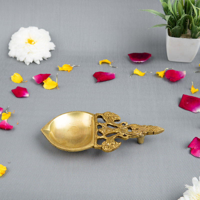 Brass Pooja Spoon - beautifully crafted brass spoon for religious rituals, ideal for offering sacred substances during prayers and ceremonies, golden finish, perfect for home puja setups and spiritual practices, symbolizes purity and devotion, enhances the sacredness of rituals, a functional and auspicious addition to your pooja essentials and religious artifacts.