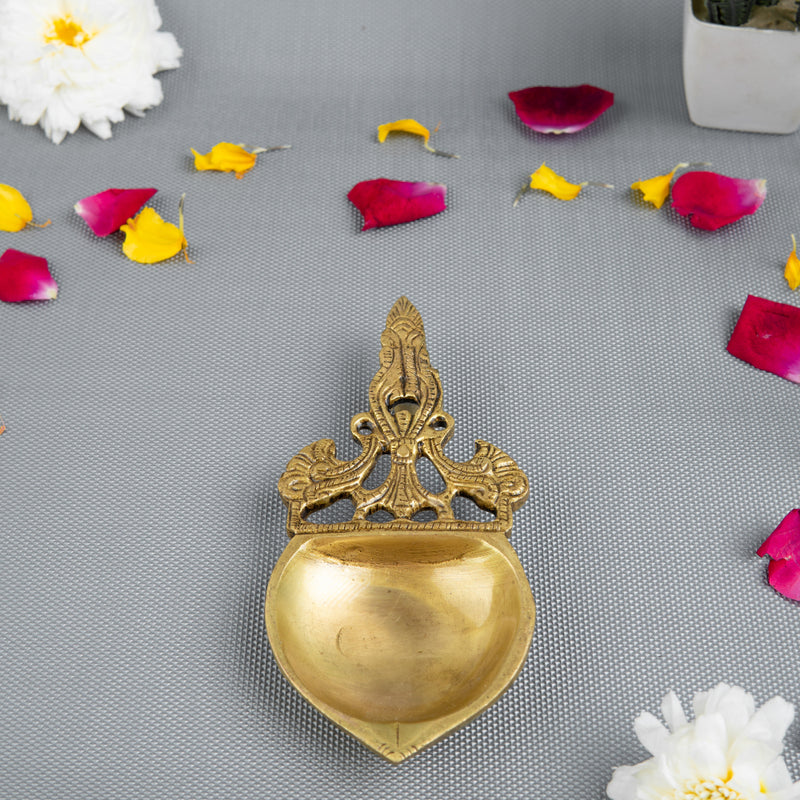 Brass Pooja Spoon - beautifully crafted brass spoon for religious rituals, ideal for offering sacred substances during prayers and ceremonies, golden finish, perfect for home puja setups and spiritual practices, symbolizes purity and devotion, enhances the sacredness of rituals, a functional and auspicious addition to your pooja essentials and religious artifacts.