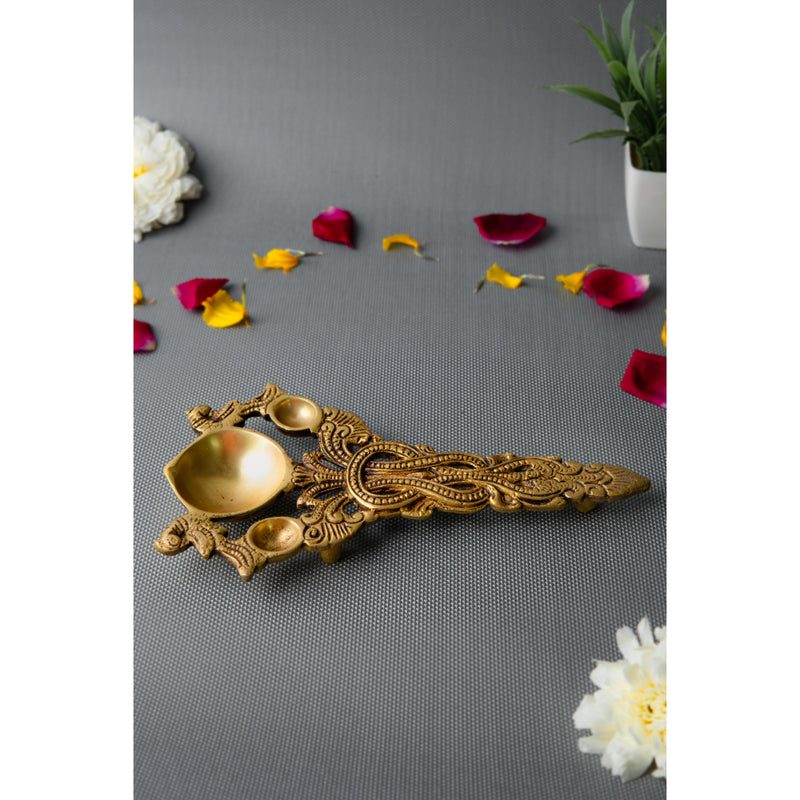 Brass Pooja Spoon - beautifully crafted brass spoon for religious rituals, ideal for offering sacred substances during prayers and ceremonies, golden finish, perfect for home puja setups and spiritual practices, symbolizes purity and devotion, enhances the sacredness of rituals, a functional and auspicious addition to your pooja essentials and religious artifacts.