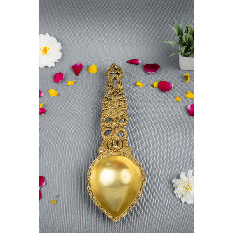 Brass Pooja Spoon - beautifully crafted brass spoon for religious rituals, ideal for offering sacred substances during prayers and ceremonies, golden finish, perfect for home puja setups and spiritual practices, symbolizes purity and devotion, enhances the sacredness of rituals, a functional and auspicious addition to your pooja essentials and religious artifacts.