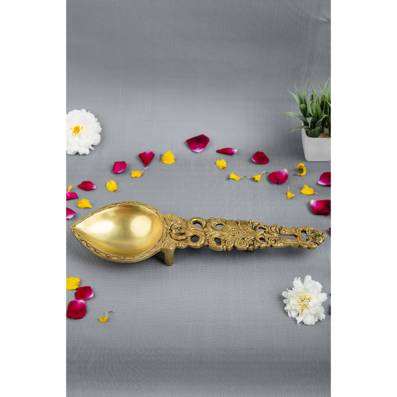 Brass Pooja Spoon - beautifully crafted brass spoon for religious rituals, ideal for offering sacred substances during prayers and ceremonies, golden finish, perfect for home puja setups and spiritual practices, symbolizes purity and devotion, enhances the sacredness of rituals, a functional and auspicious addition to your pooja essentials and religious artifacts.