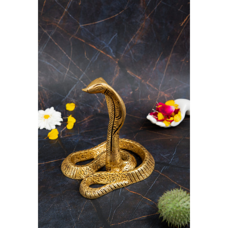 Brass Snake - exquisitely crafted brass snake figurine, golden finish, decorative home accent, symbolizes wisdom, rebirth, and transformation, perfect for adding a touch of intrigue and mystique to your decor, ideal for collectors and enthusiasts of brass artifacts, enhances the ambiance with its intricate details and unique design, a captivating and symbolic addition to your collection of brass sculptures and figurines.