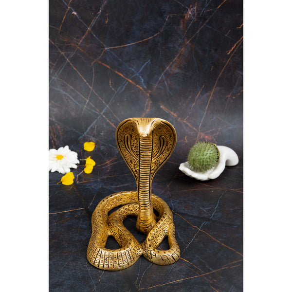 Brass Snake - exquisitely crafted brass snake figurine, golden finish, decorative home accent, symbolizes wisdom, rebirth, and transformation, perfect for adding a touch of intrigue and mystique to your decor, ideal for collectors and enthusiasts of brass artifacts, enhances the ambiance with its intricate details and unique design, a captivating and symbolic addition to your collection of brass sculptures and figurines.