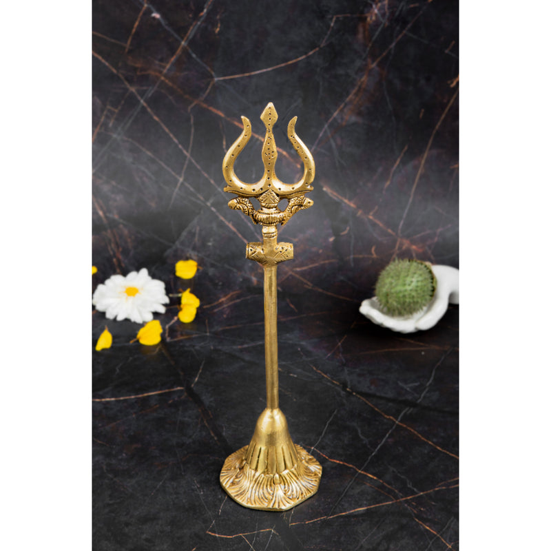 Brass Trishul - meticulously designed brass Trishul (trident), golden finish, symbolic weapon of Lord Shiva, perfect for worship and spiritual practices, ideal for creating a divine ambiance in your home or temple, represents power, protection, and destruction of negativity, enhances the spiritual energy and fosters a sense of devotion, a sacred and captivating addition to your collection of brass artifacts.