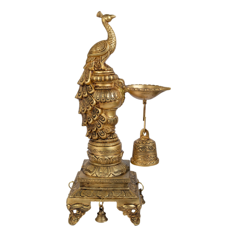 Brass peacock parrot Diya - exquisitely crafted brass oil lamp in the shape of a peacock with parrot motifs, golden finish, decorative home accent, fusion of elegance and vibrancy, traditional Indian Diya, emits a captivating and auspicious glow, perfect for festive occasions and religious ceremonies, enhances spiritual ambiance and decor with a touch of artistic brilliance.