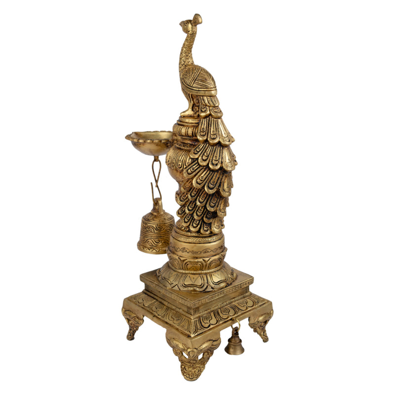 Brass peacock parrot Diya - exquisitely crafted brass oil lamp in the shape of a peacock with parrot motifs, golden finish, decorative home accent, fusion of elegance and vibrancy, traditional Indian Diya, emits a captivating and auspicious glow, perfect for festive occasions and religious ceremonies, enhances spiritual ambiance and decor with a touch of artistic brilliance.