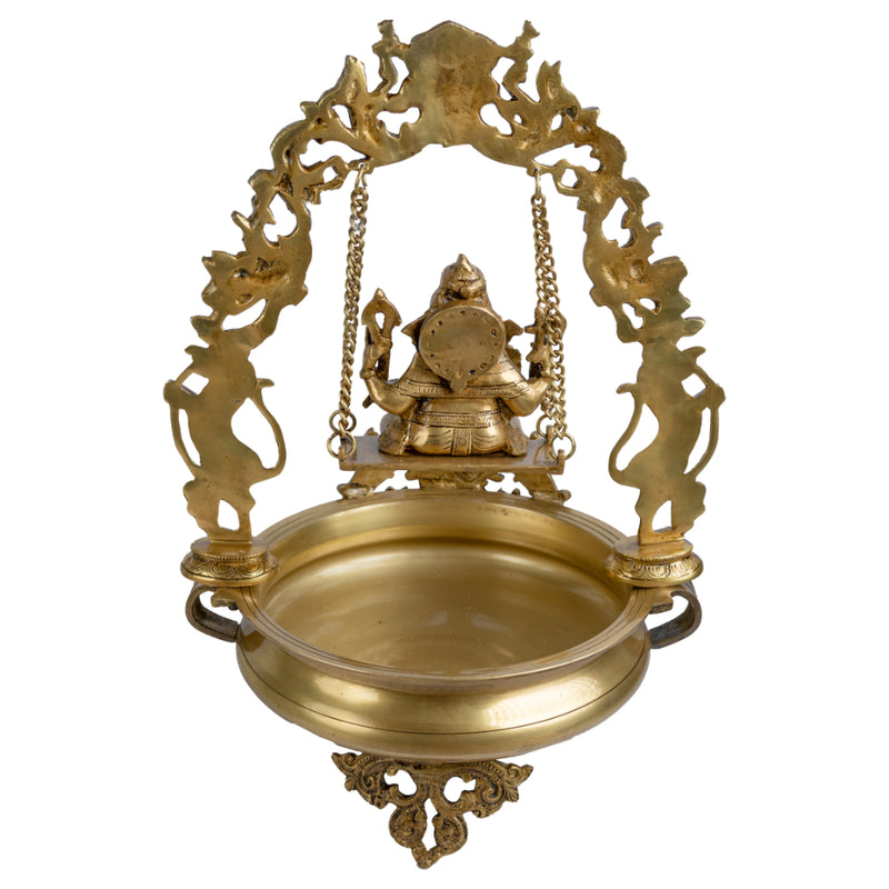 Brass Lakshmi & Ganesh Ji Urli - intricately crafted brass decorative bowl featuring idols of Goddess Lakshmi and Lord Ganesh, golden finish, traditional Indian Urli, versatile home accent, ideal for floating flower petals or candles, symbolizes prosperity and blessings, adds a touch of divinity and cultural richness to any space, perfect for creating an auspicious ambiance and enhancing interior decor, a timeless piece of art for both indoor and outdoor settings.