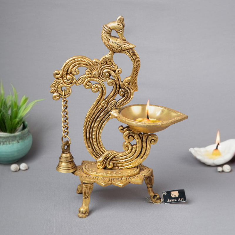 Brass peacock parrot Diya - exquisitely crafted brass oil lamp in the shape of a peacock with parrot motifs, golden finish, decorative home accent, fusion of elegance and vibrancy, traditional Indian Diya, emits a captivating and auspicious glow, perfect for festive occasions and religious ceremonies, enhances spiritual ambiance and decor with a touch of artistic brilliance.