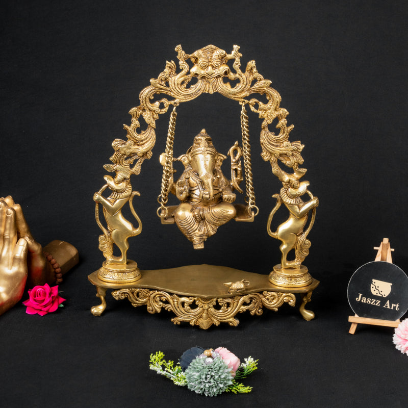 Brass God Ganesha Ji - intricately designed brass statue of Lord Ganesha, golden finish, auspicious and beloved deity, perfect for home decor and spiritual spaces, ideal for invoking blessings and removing obstacles, symbolizes wisdom, prosperity, and good fortune, enhances the spiritual energy and fosters a sense of divine presence, a sacred and revered addition to your collection of brass sculptures and figurines.