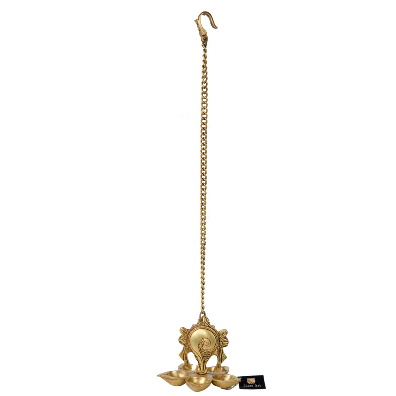 Brass Wall Diya - intricately designed brass oil lamp for wall mounting, golden finish, decorative home accent, traditional Indian Diya, emits a warm and inviting glow, ideal for enhancing wall decor and creating an ambiance of serenity, perfect for religious ceremonies and festive occasions, adds a touch of traditional charm to interior spaces.