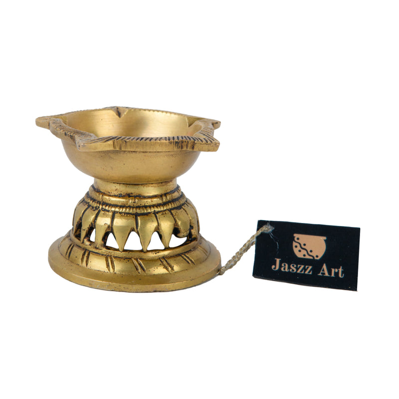 Brass small Akhand Diya - intricately designed brass oil lamp, compact size, traditional Indian Diya, golden finish, decorative home accent, emits a warm and serene glow, ideal for religious ceremonies and meditation, enhances spiritual ambiance and decor.