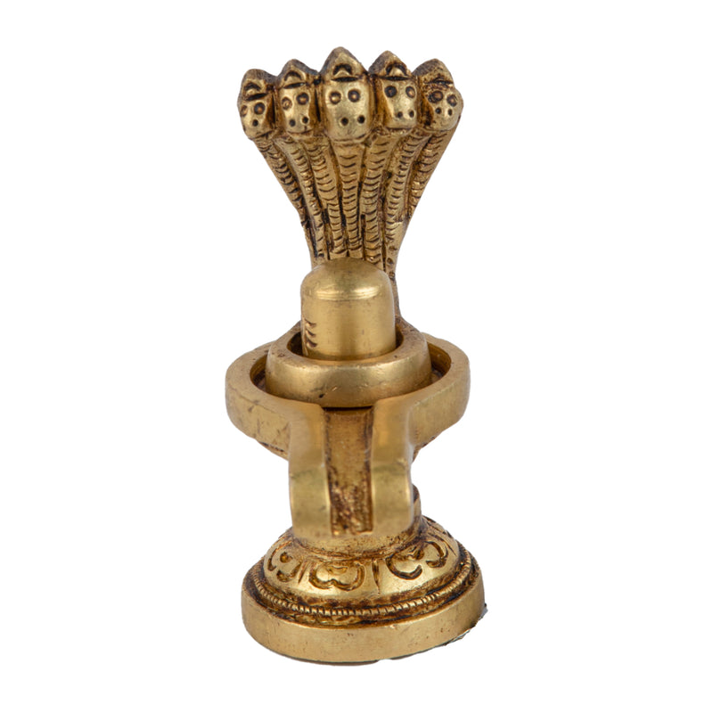 Brass Shivling - intricately crafted brass Shivling (Shiva Lingam), golden finish, sacred symbol of Lord Shiva, perfect for worship and meditation, ideal for creating a divine ambiance in your home or temple, symbolizes the cosmic energy and represents the formless nature of Lord Shiva, enhances spiritual practices and fosters a sense of reverence, a beautiful and sacred addition to your collection of brass artifacts.