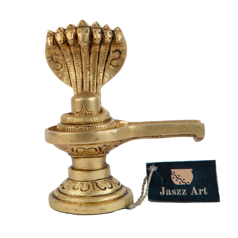 Brass Shivling - intricately crafted brass Shivling (Shiva Lingam), golden finish, sacred symbol of Lord Shiva, perfect for worship and meditation, ideal for creating a divine ambiance in your home or temple, symbolizes the cosmic energy and represents the formless nature of Lord Shiva, enhances spiritual practices and fosters a sense of reverence, a beautiful and sacred addition to your collection of brass artifacts.