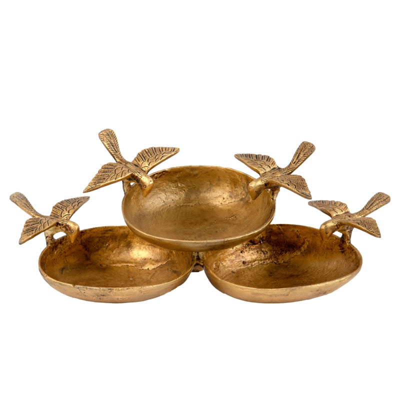 Brass Bird Urli - meticulously crafted brass decorative bowl with bird motifs, golden finish, traditional Indian Urli, versatile home accent, ideal for floating flower petals or candles, adds a touch of nature-inspired elegance to any space, perfect for creating a serene ambiance and enhancing interior decor, a symbol of freedom and grace, a timeless piece of art for both indoor and outdoor settings, brings harmony and tranquility to your living space.