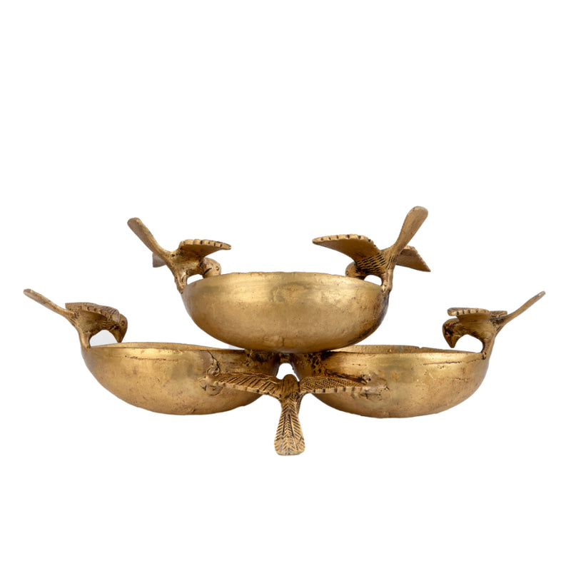 Brass Bird Urli - meticulously crafted brass decorative bowl with bird motifs, golden finish, traditional Indian Urli, versatile home accent, ideal for floating flower petals or candles, adds a touch of nature-inspired elegance to any space, perfect for creating a serene ambiance and enhancing interior decor, a symbol of freedom and grace, a timeless piece of art for both indoor and outdoor settings, brings harmony and tranquility to your living space.