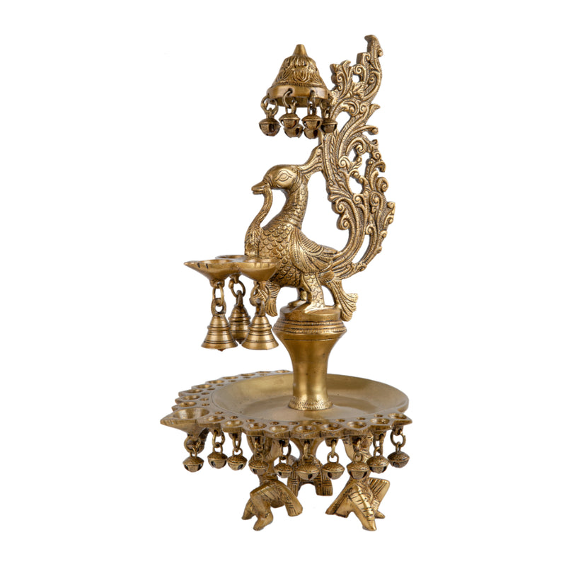 Brass peacock parrot Diya - exquisitely crafted brass oil lamp in the shape of a peacock with parrot motifs, golden finish, decorative home accent, fusion of elegance and vibrancy, traditional Indian Diya, emits a captivating and auspicious glow, perfect for festive occasions and religious ceremonies, enhances spiritual ambiance and decor with a touch of artistic brilliance.