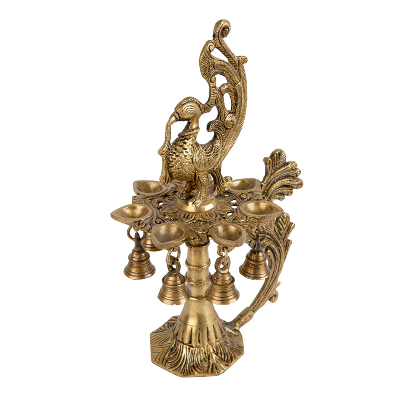 Brass peacock parrot Diya - exquisitely crafted brass oil lamp in the shape of a peacock with parrot motifs, golden finish, decorative home accent, fusion of elegance and vibrancy, traditional Indian Diya, emits a captivating and auspicious glow, perfect for festive occasions and religious ceremonies, enhances spiritual ambiance and decor with a touch of artistic brilliance.